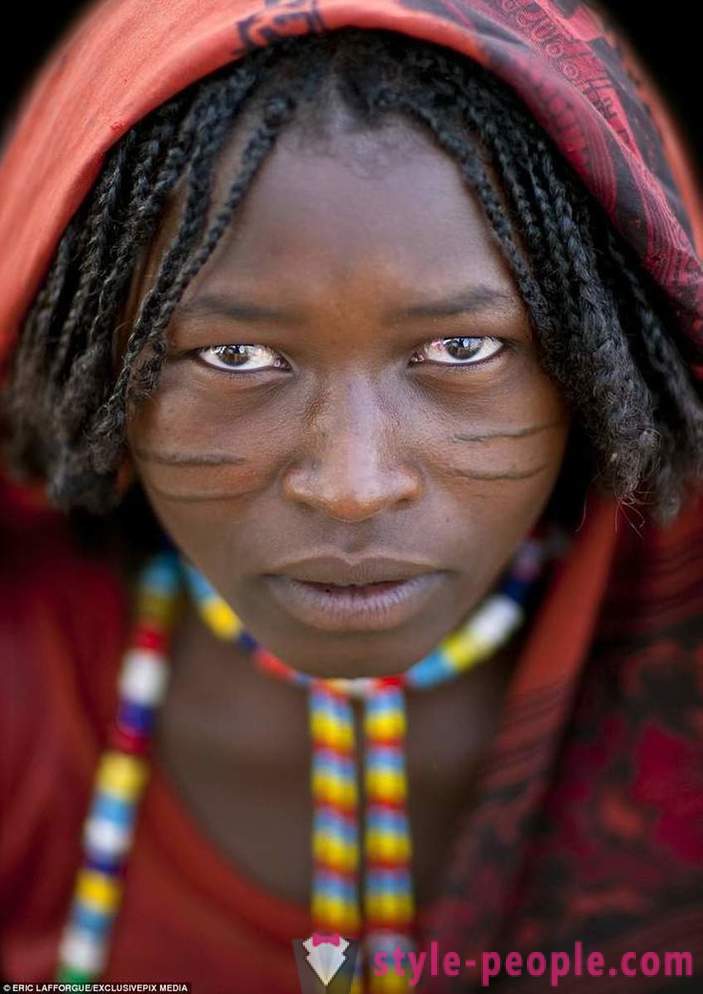 In Africa, the scars adorn not only men