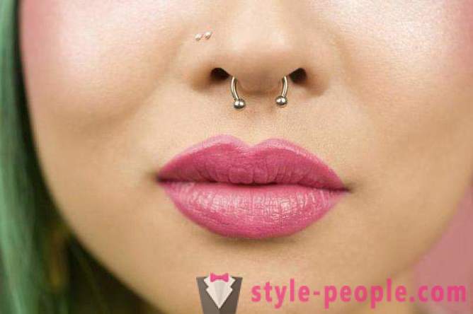 Who wears the nose ring, and why?